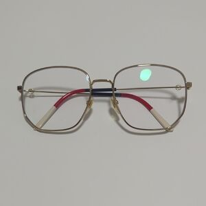 Gucci Gold Frame Glasses with Red and Blue Accents